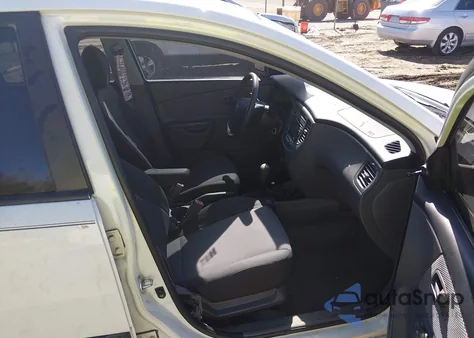 2009 Kia Rio Lx z USA, uszkodzony, nr VIN KNADE223296444929